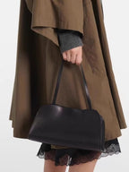 Women's Leather Bag in coffee color plain weave - product photo 1