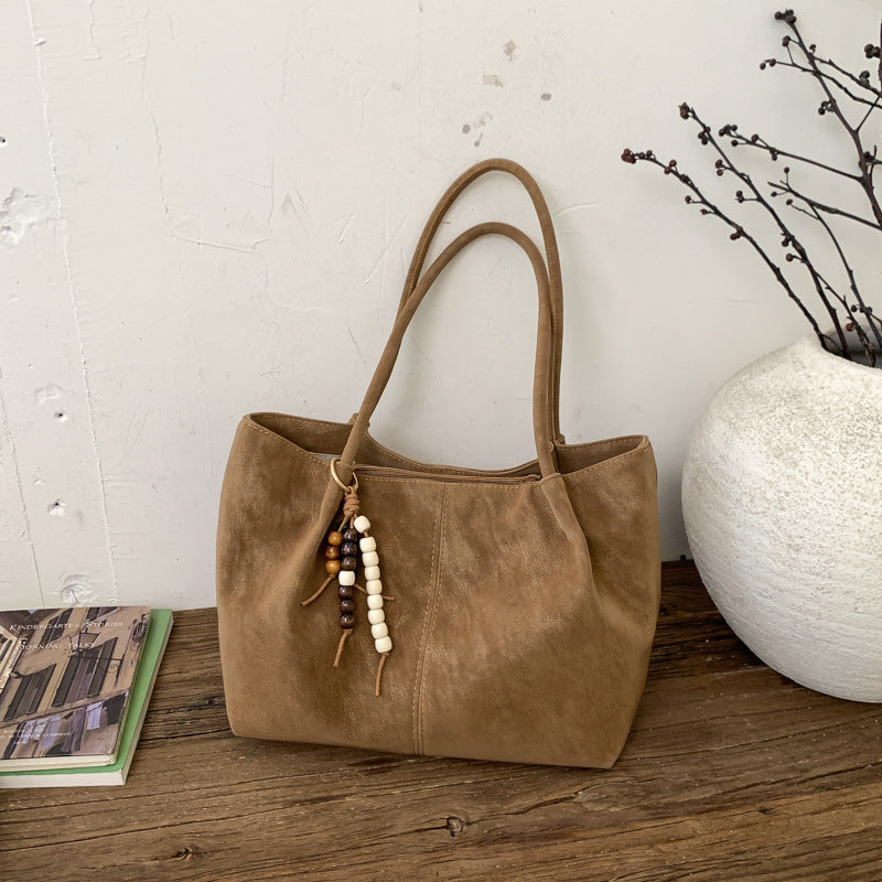 Women's Shoulder Bag in brown with pendant - product photo 6