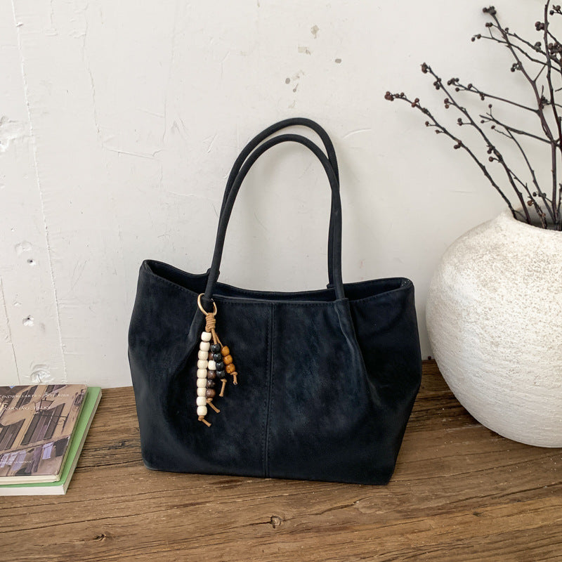 Women's Shoulder Bag in brown with pendant - product photo 9